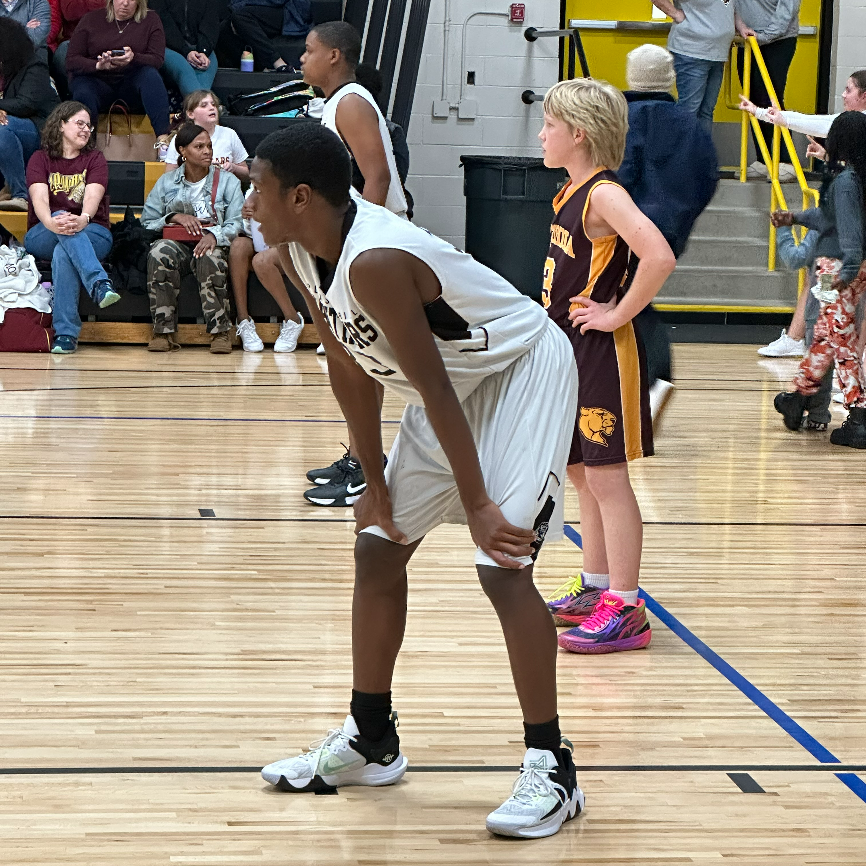 students playing basketball