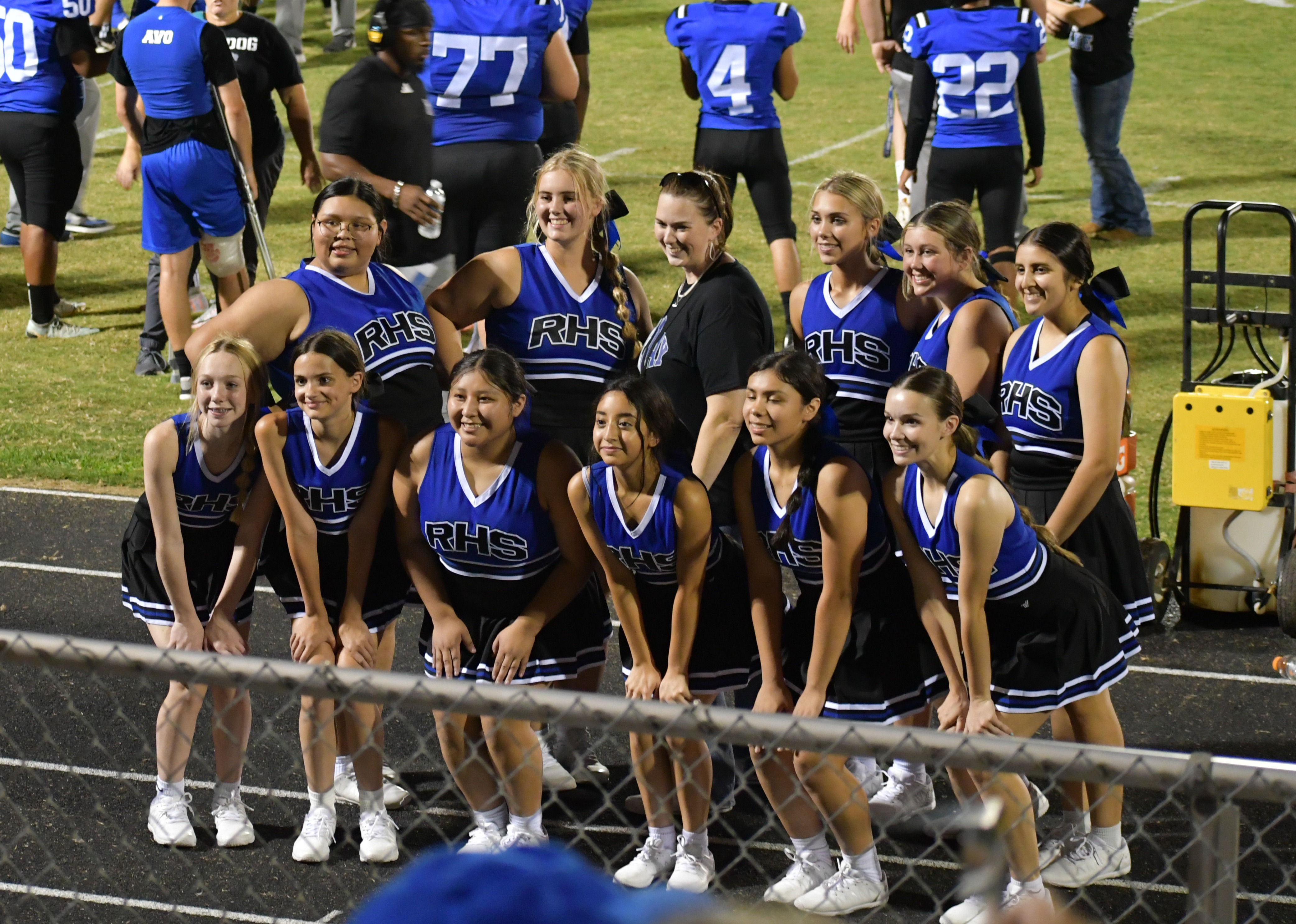 A group photo of 2024 rice school district bulldogs cheerleader with their mascot