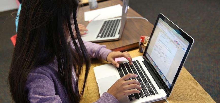 A girl using a laptop