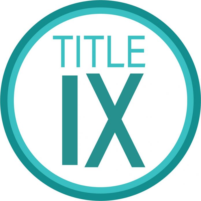 Title X logo: A simple and sleek logo featuring the text "Title X" in bold, black letters on a white background.