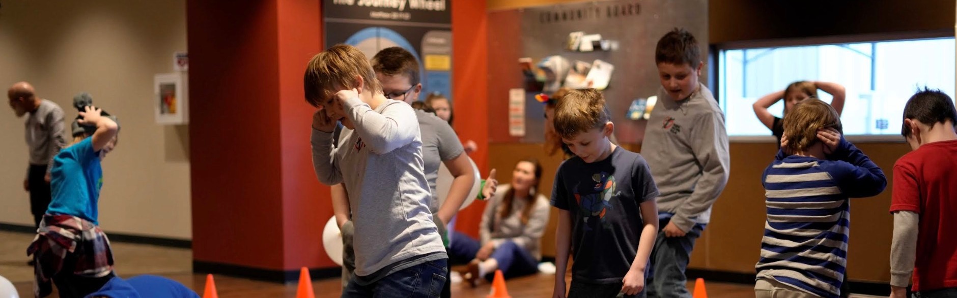 photos of students posing with a blueberry
