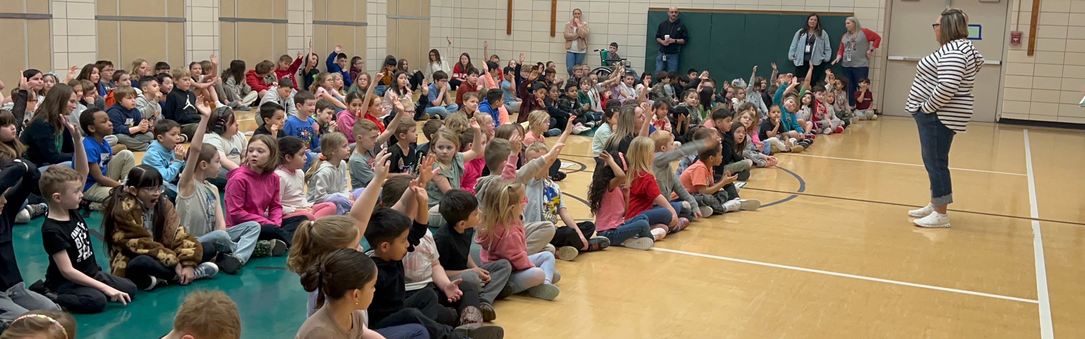 photos of students posing with a blueberry