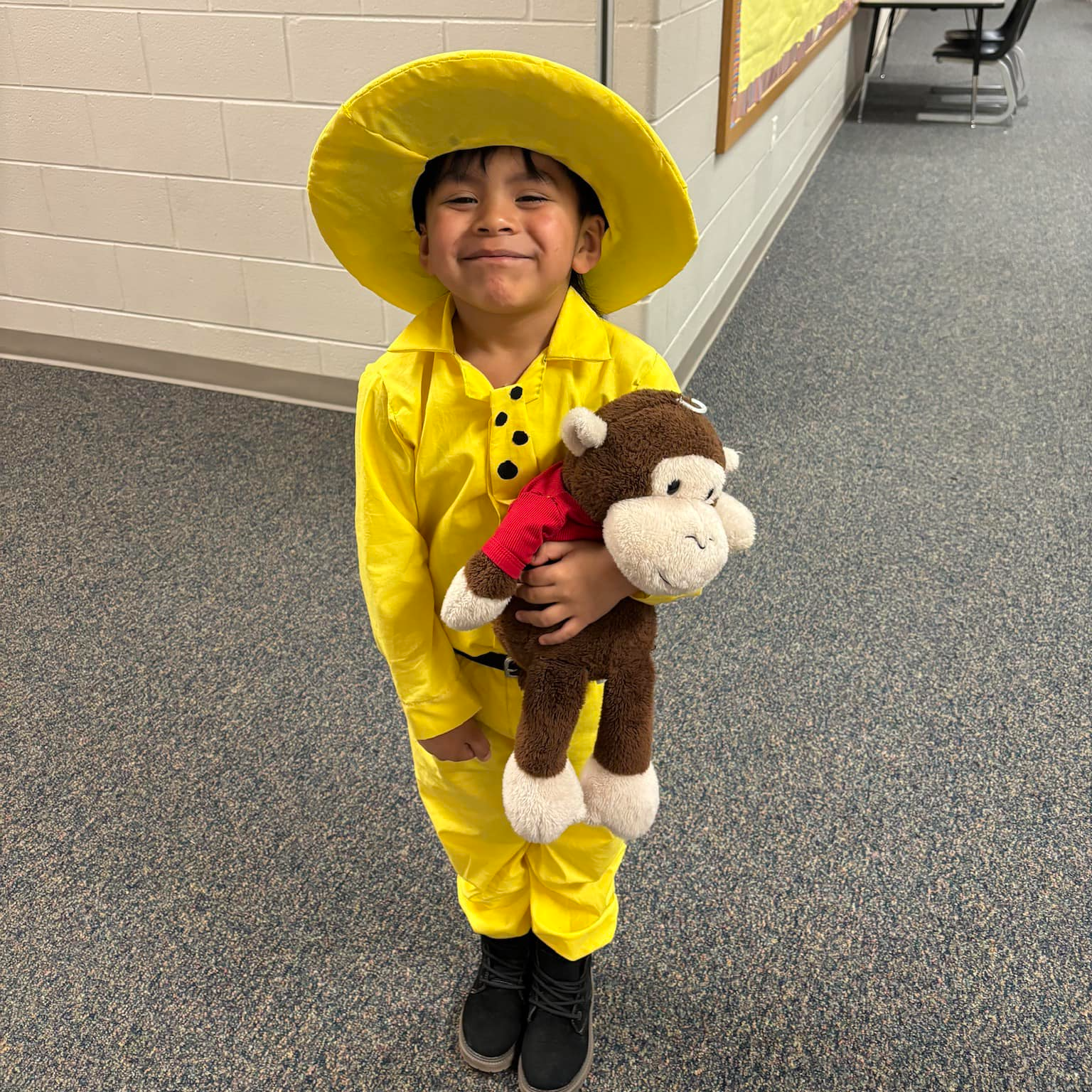 student dressed as curious george