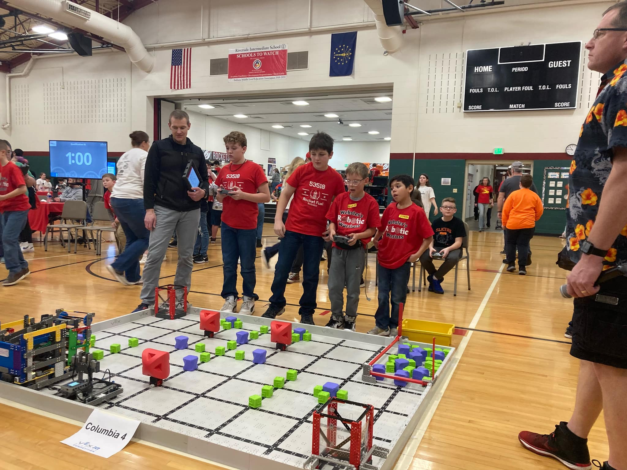 students competing in robotics competition