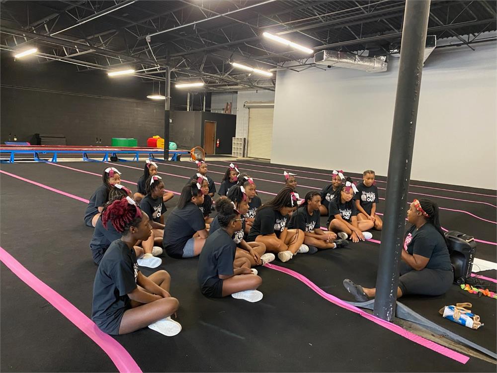 Practice at The Cheer Gym - team talk with Coach Caryl