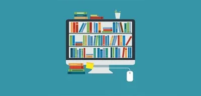 computer with books wallpaper