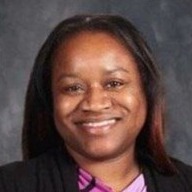 Adult woman principal smiling