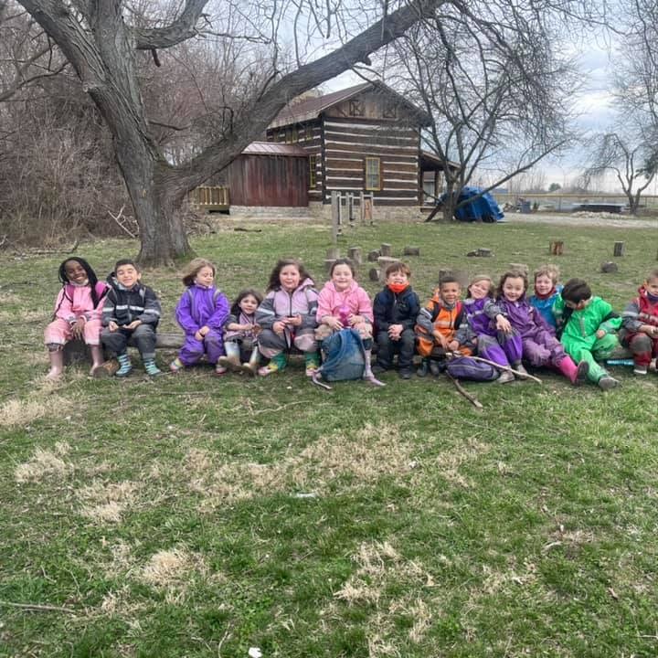 Young elementary age students exploring classroom activities