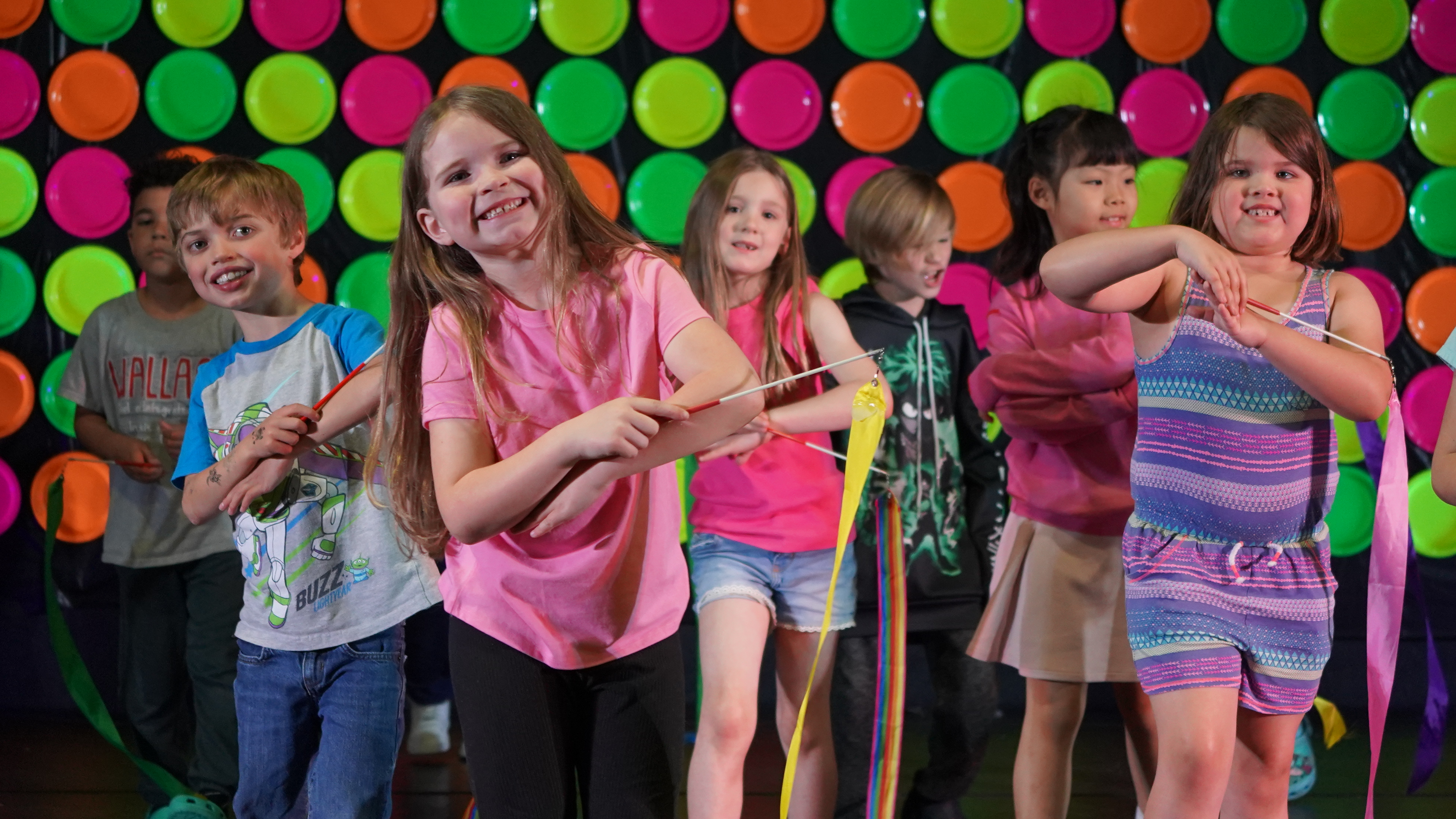 Young elementary age students exploring classroom activities