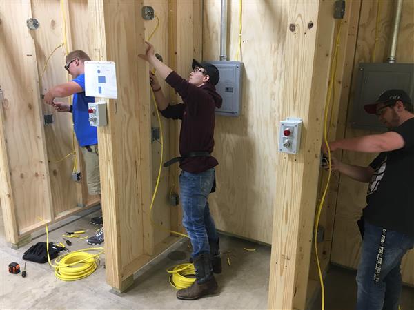 electrical tech students at work