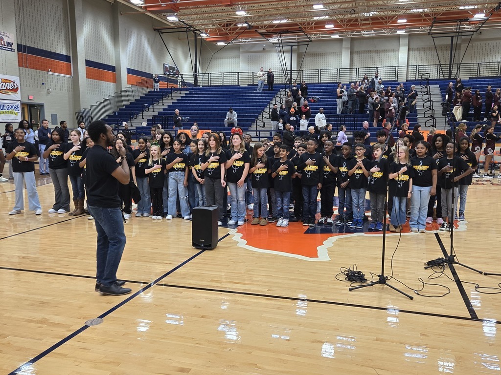 Press Pride Performers performing National Anthem for McKinney North High School