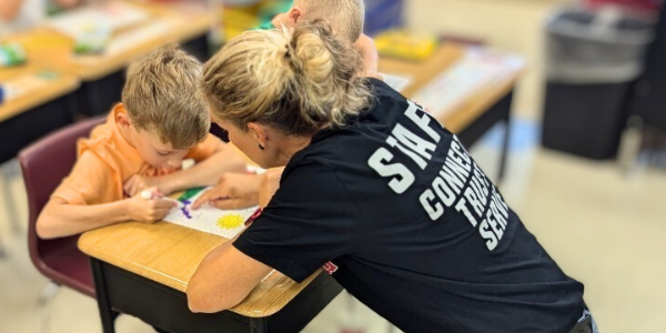 substitute teacher helps student