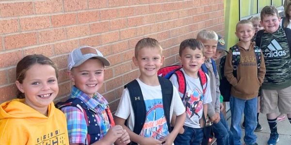 children wait in a line