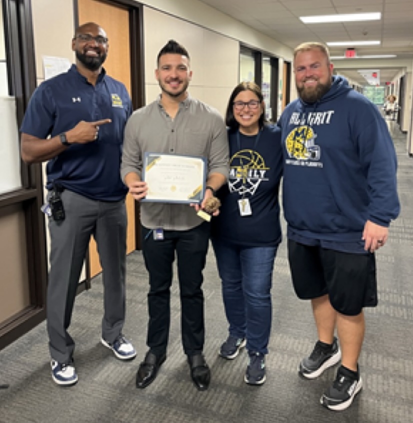 Coach Rafael Rubalcaba is honored as the Teacher of the Week