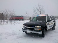 Police truck parked in the snow