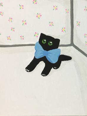 black cat wuth a blue bow