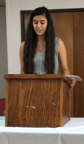student on a stand