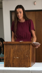 student on a stand