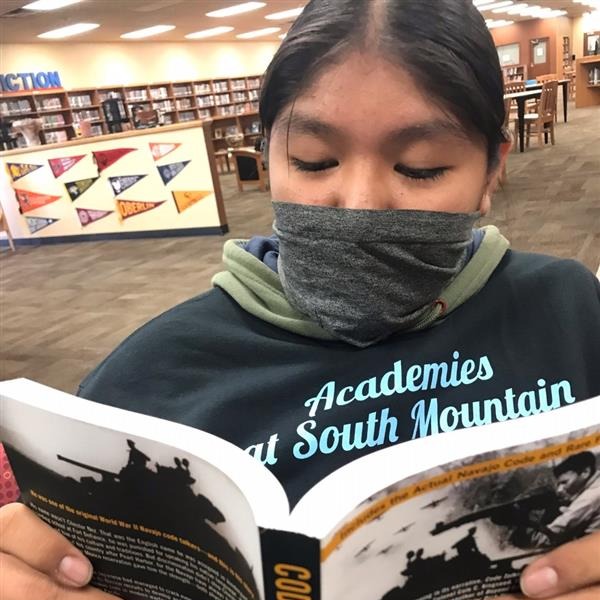 Student holding a book