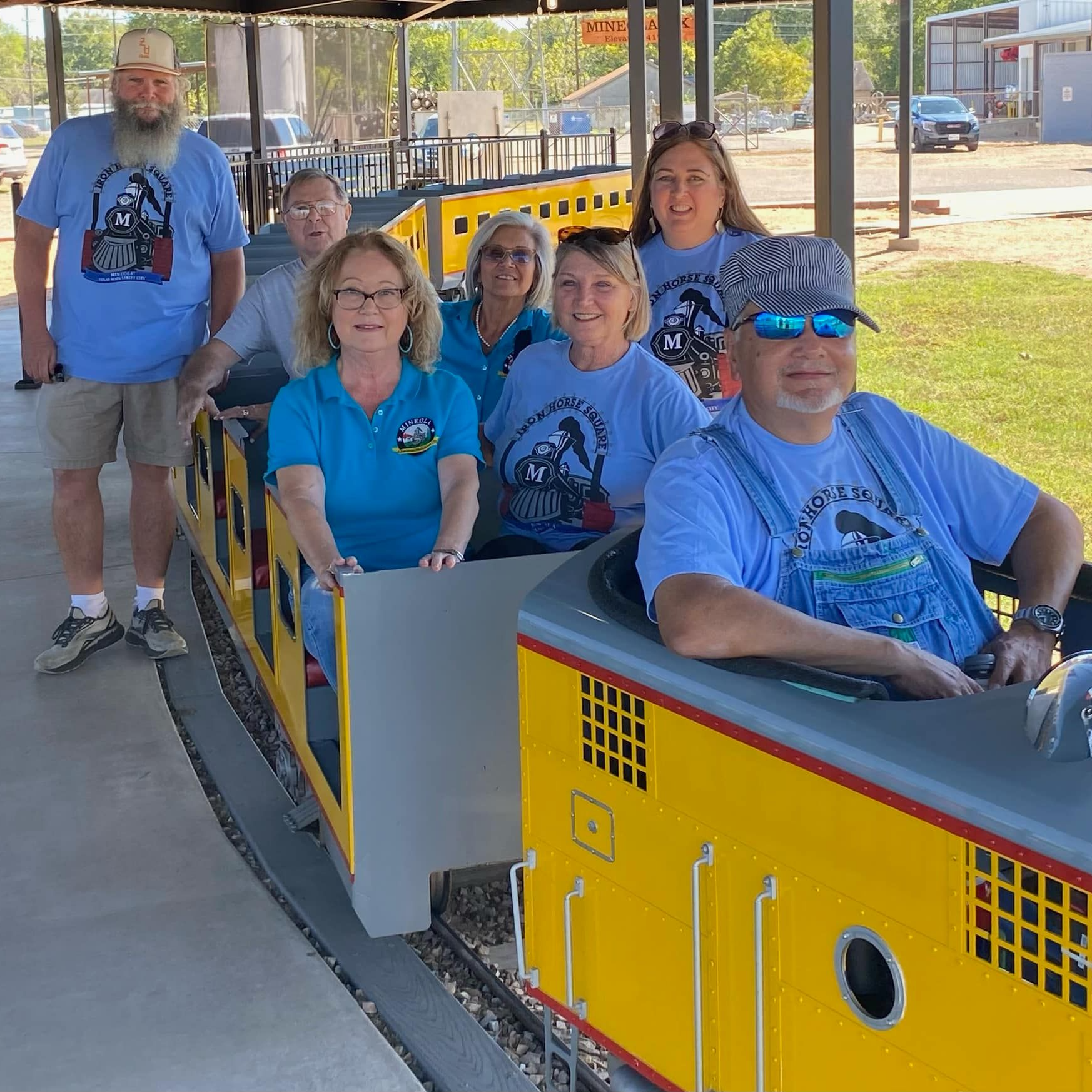 staff in a mini train