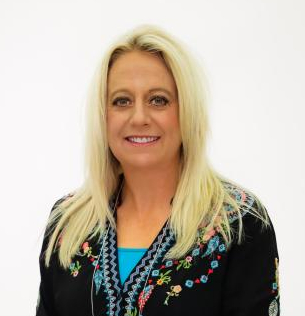 A photo of a woman in formal attire