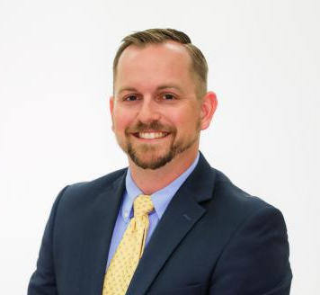 A photo of a man in formal attire