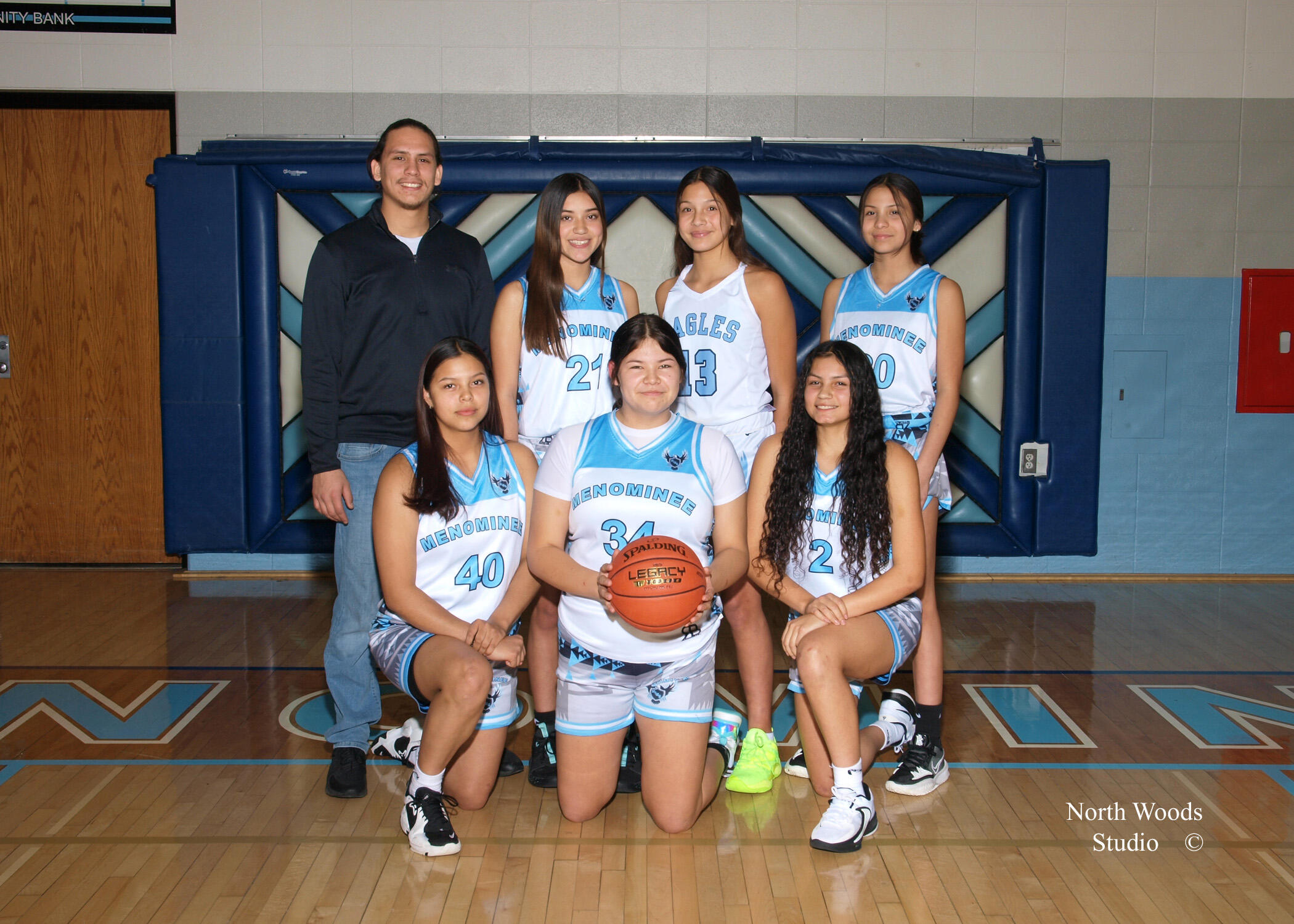 A group of young people posing for a photo