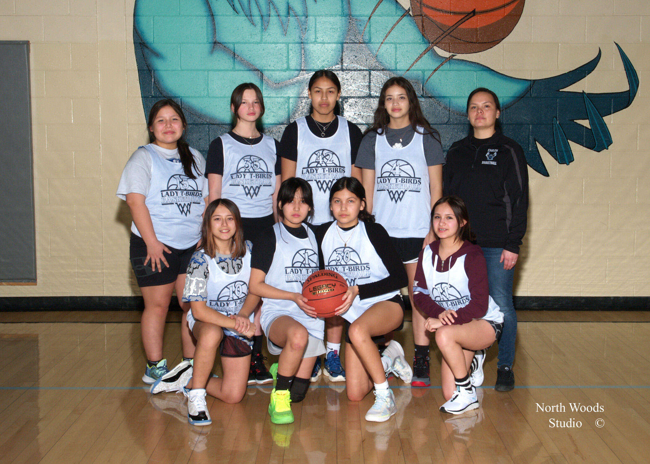 a group of young people posing for a photo