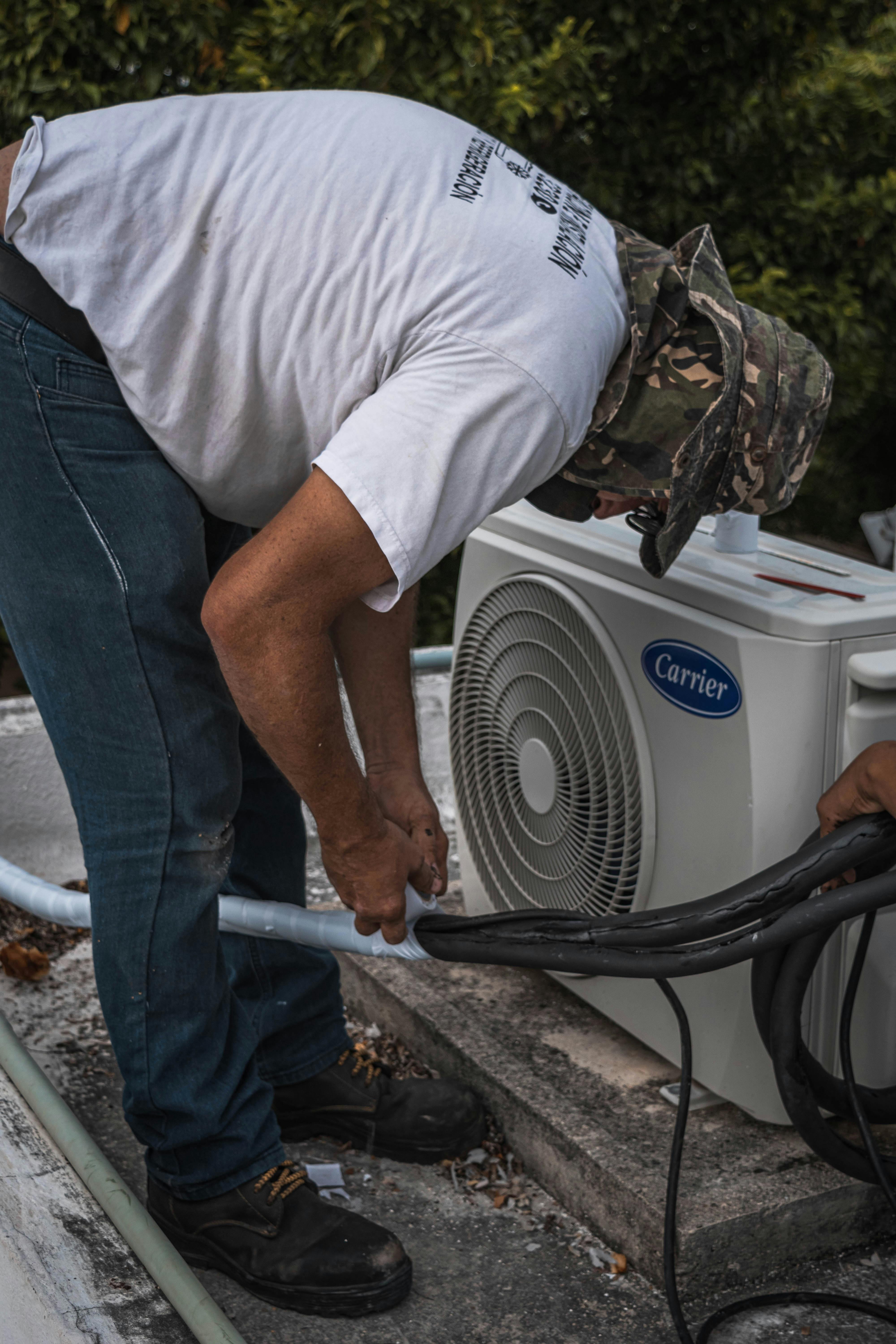 Student working with HVAC Systems at School