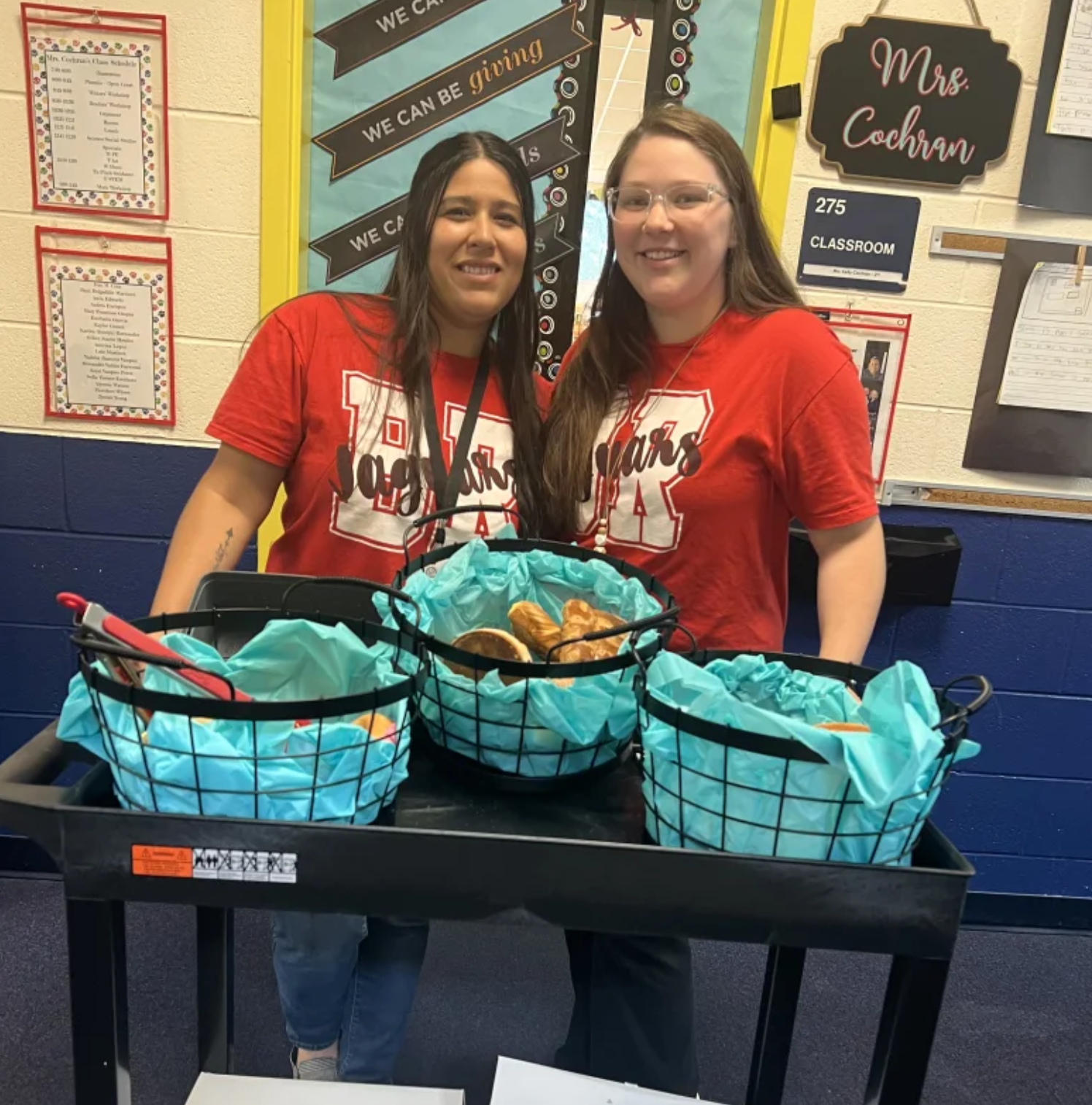 two girls serving bread