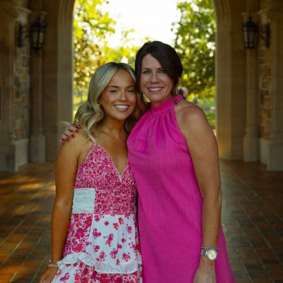 Parent, Jaime Beckler, standing with her son, Will