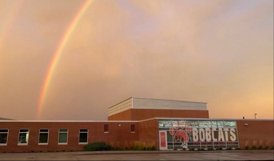 School buildng with rainbow
