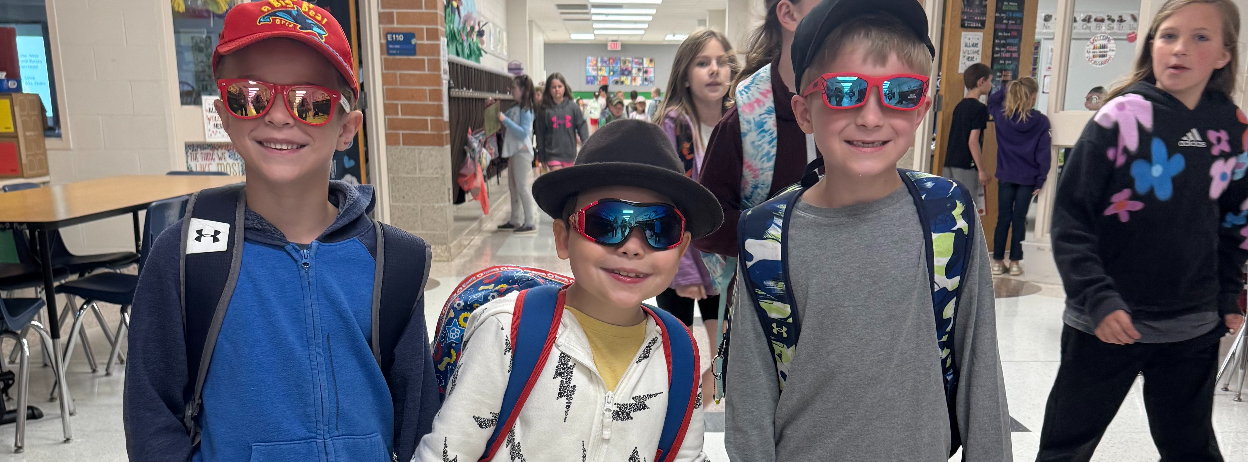 Three Elementary Students with Sunglasses on