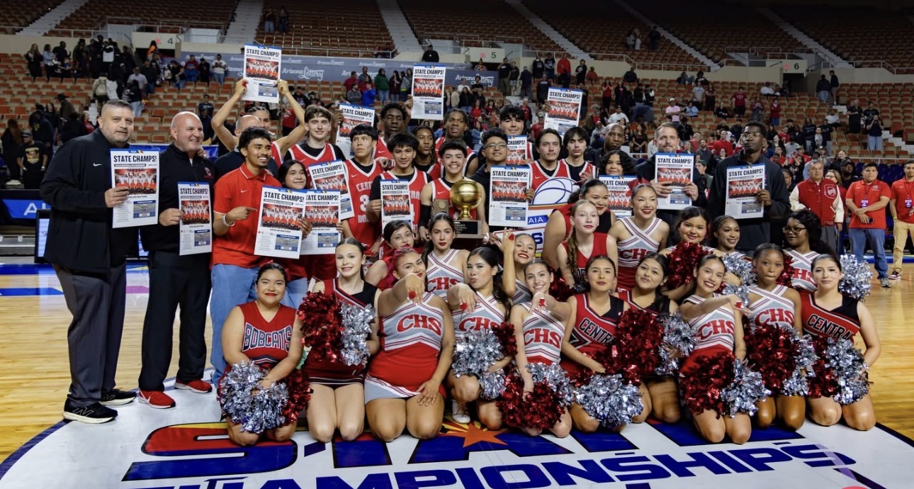 basketball players, cheer leaders,  and coaches with AIA posters in their hands