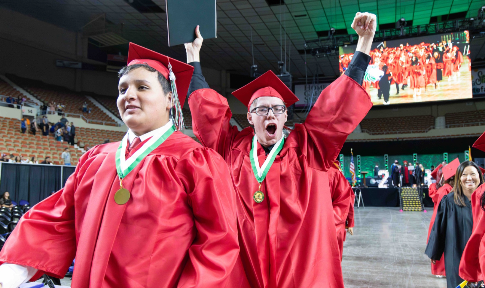 students celebrating graduation