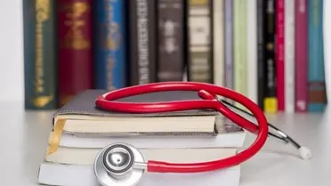 stethoscope and a book