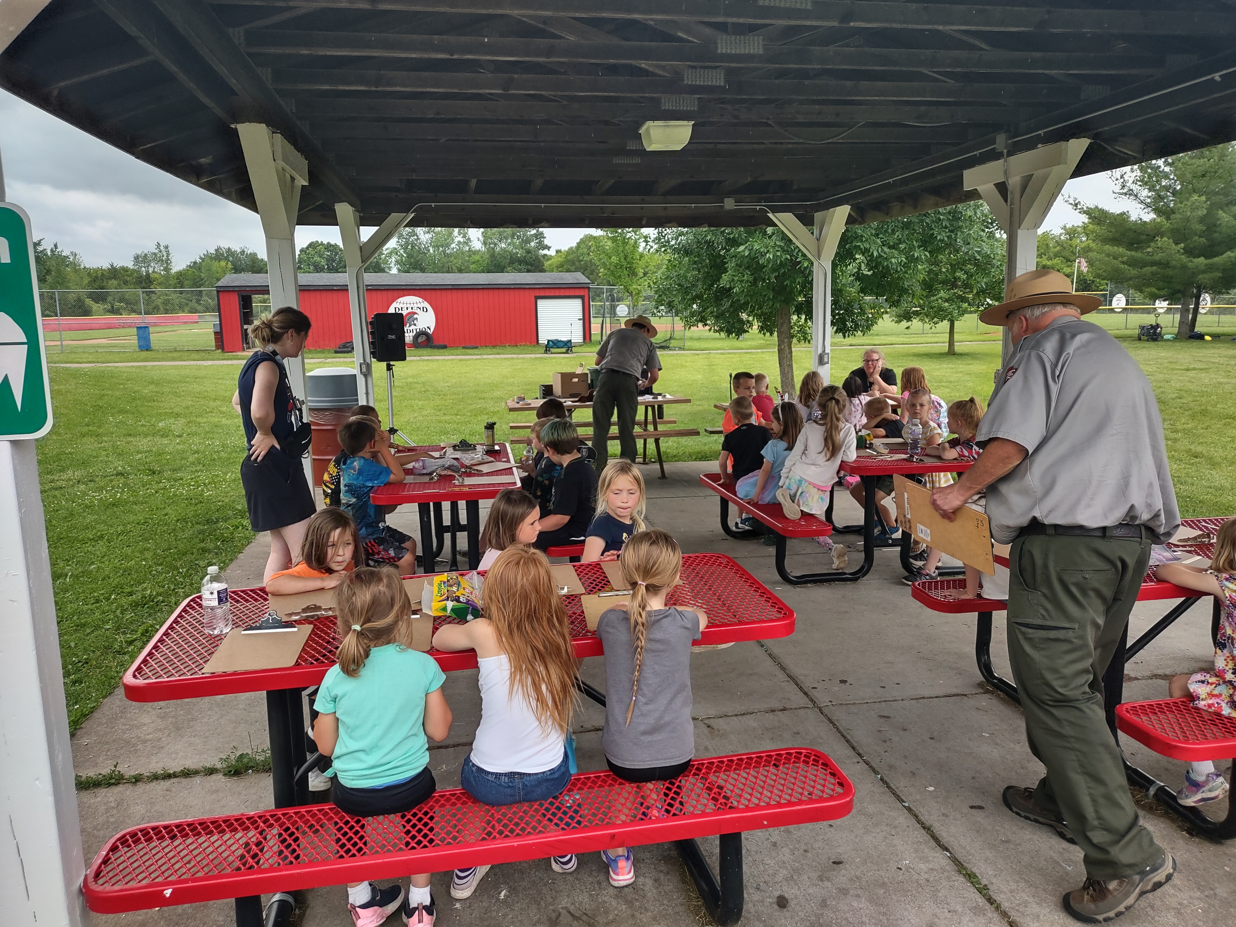 Summer school students learning about nature from a national park service ranger