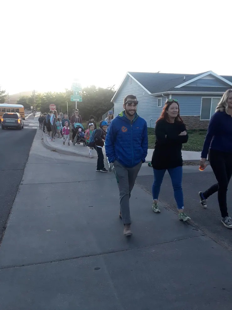 parents walking to school with kids