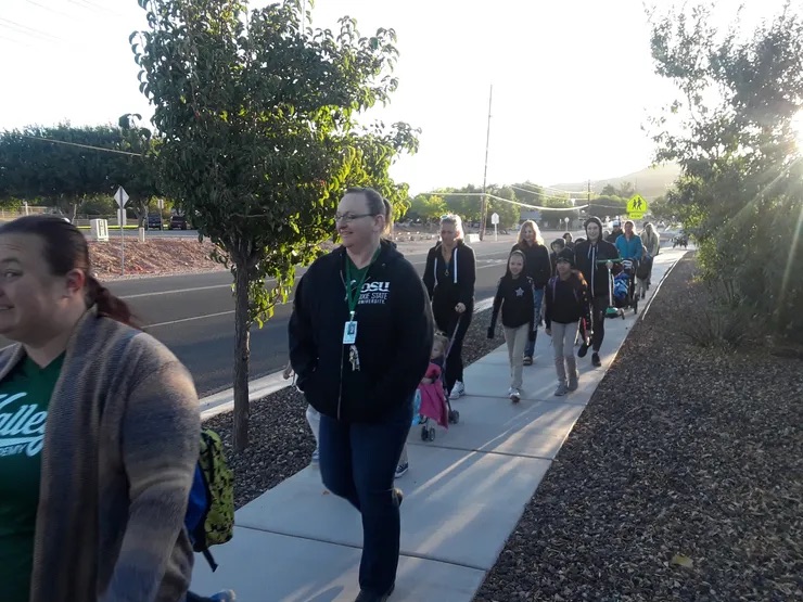 parents and student walking 
