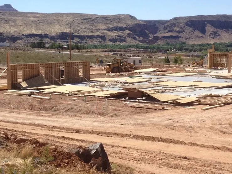Under construction: A new housing development in a rural setting, with excavation underway on a sunny day.