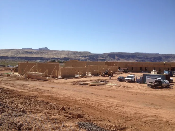 A remote construction site in a desert-like environment.