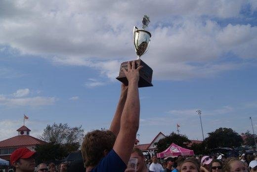 person holding trophy