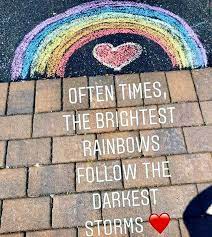 often times, the brightest rainbows follow the darkest storms. picture is of a chalk drawing of a rainbow on a brick sidewalk