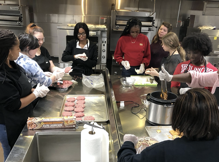 Students making hamburgers