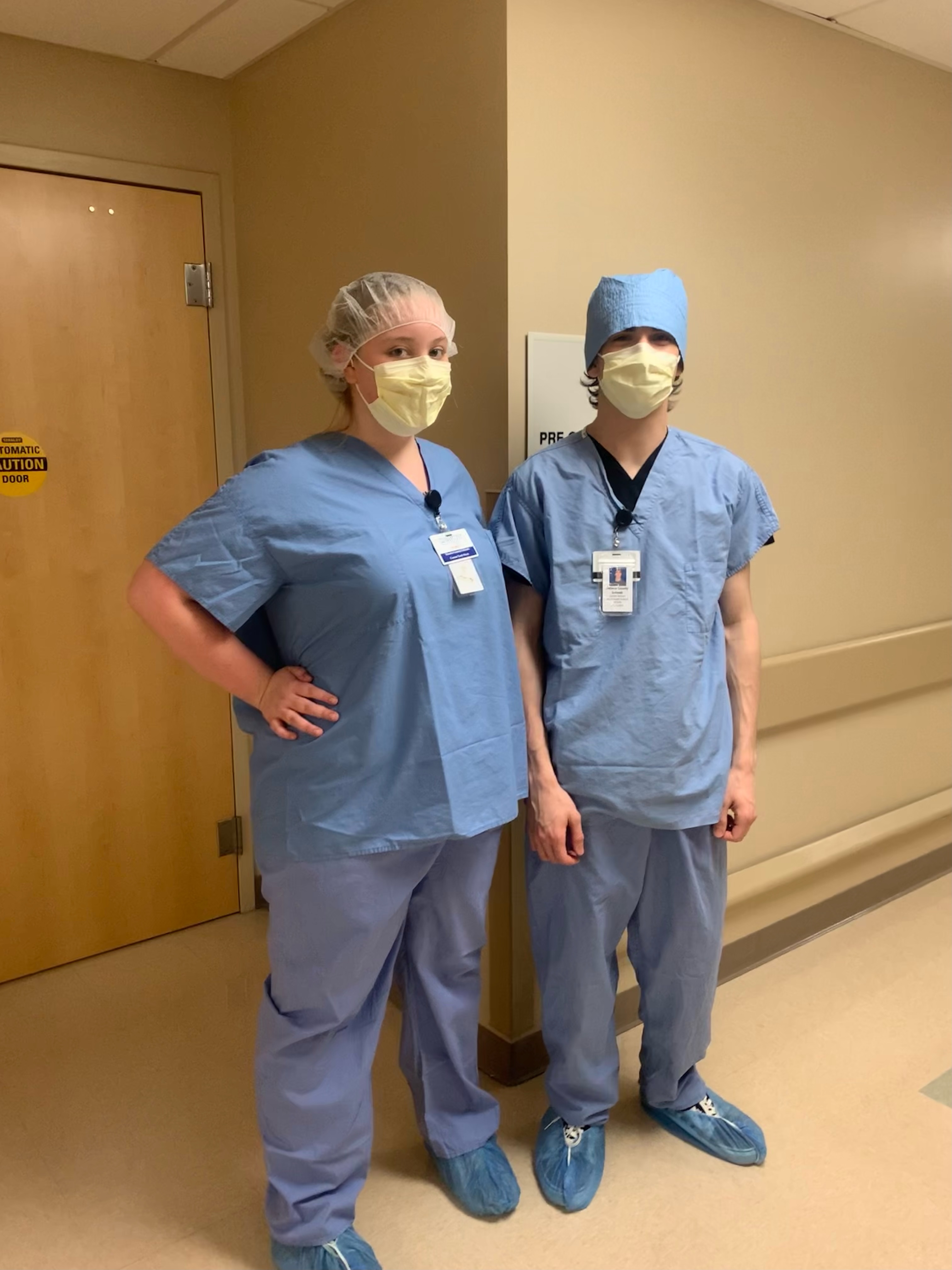 Students in Scrubs posing for picture