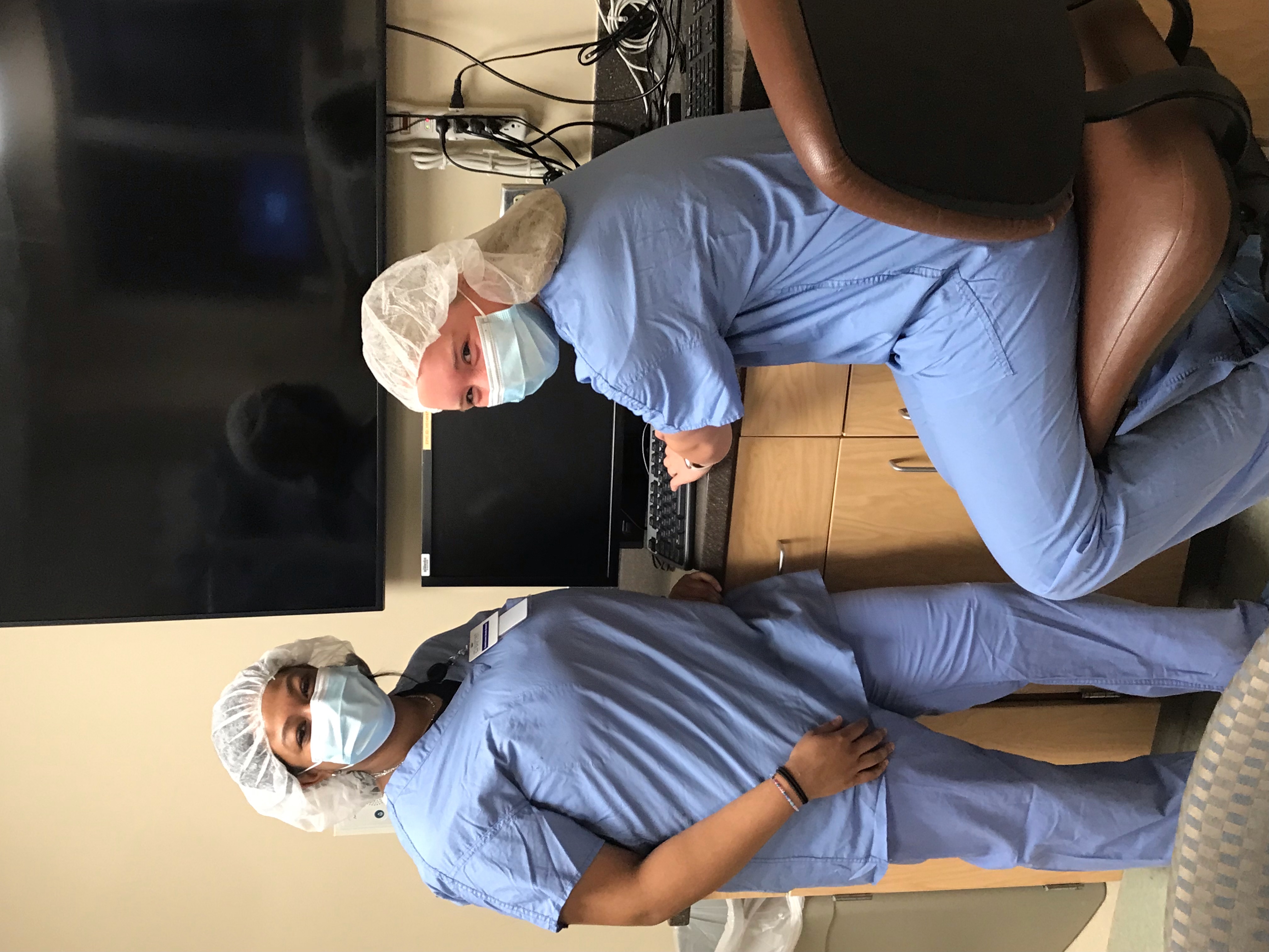 Students in Scrubs posing for picture