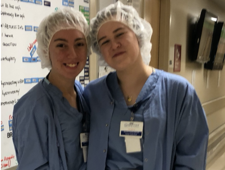 Students in Scrubs posing for picture
