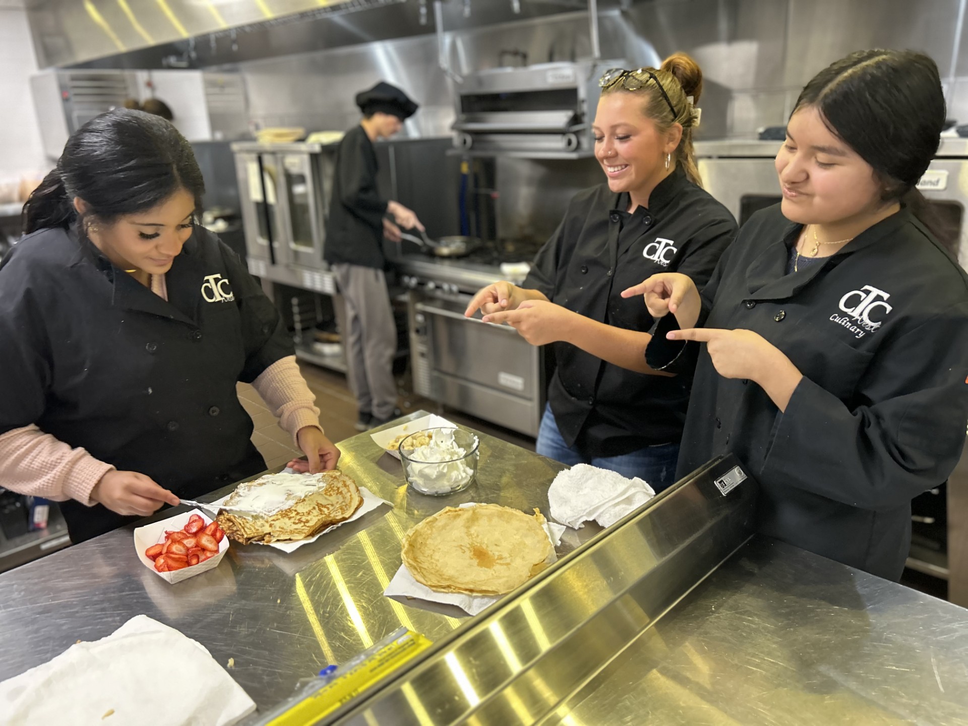 Students making hamburgers
