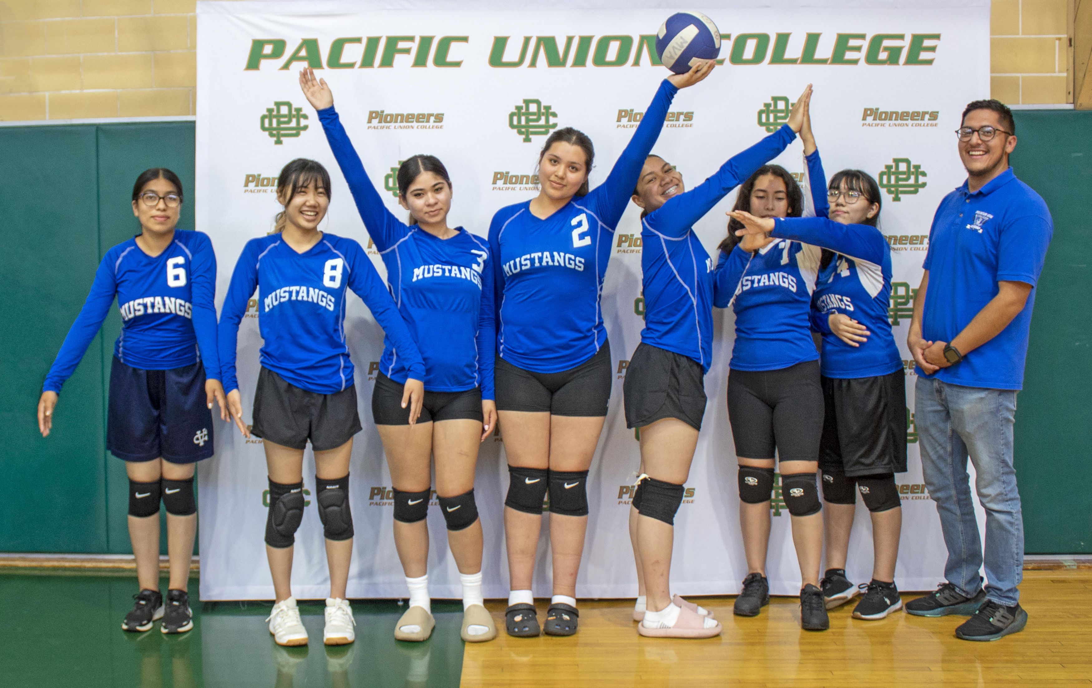 volleyball team in a group