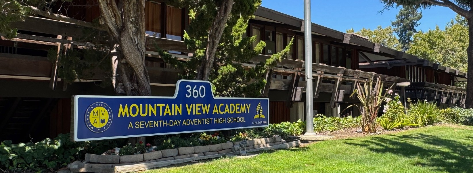 mountain view academy sign in front of building